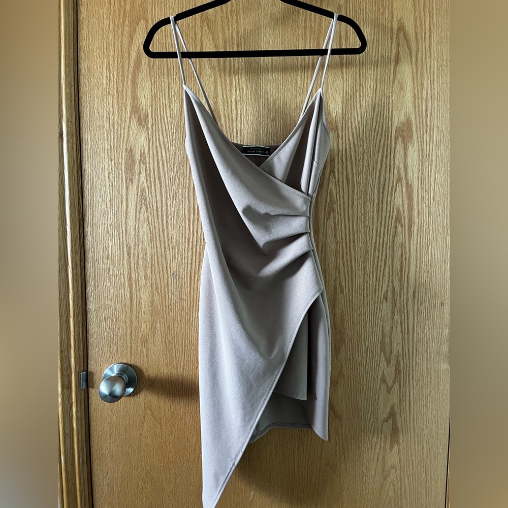 Asymmetrical Body on Dress With V Neck